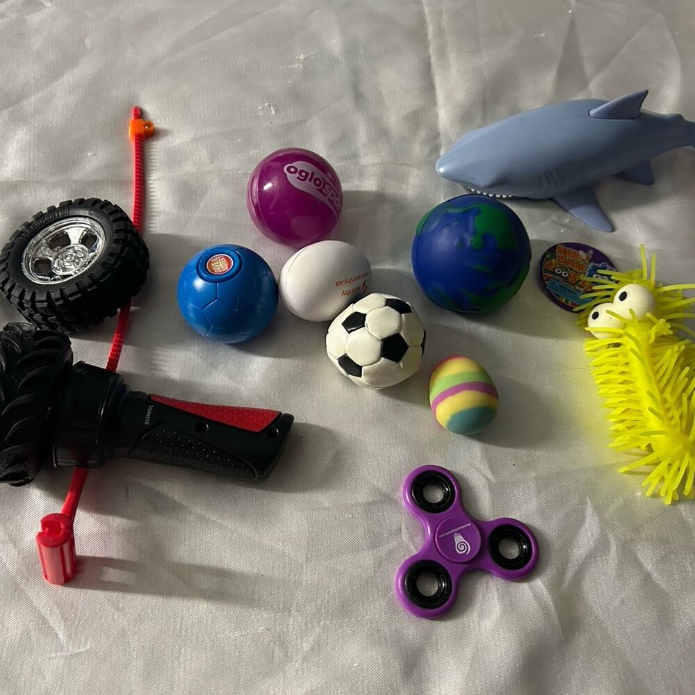 Toys! Shark, squeeze balls, fidget spinner, wheel launcher